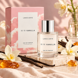Lake & Skye 11 11 Vanilla Eau de Parfum 1.7 oz (50ml) perfume bottle with pink cloud-inspired packaging, styled with vanilla flowers and warm amber accents.