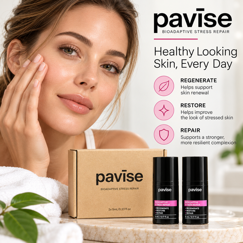Pavise Bioadaptive Stress Repair Mini 2 x 5ml skincare set with two black bottles and kraft packaging displayed alongside a woman with radiant-looking skin.