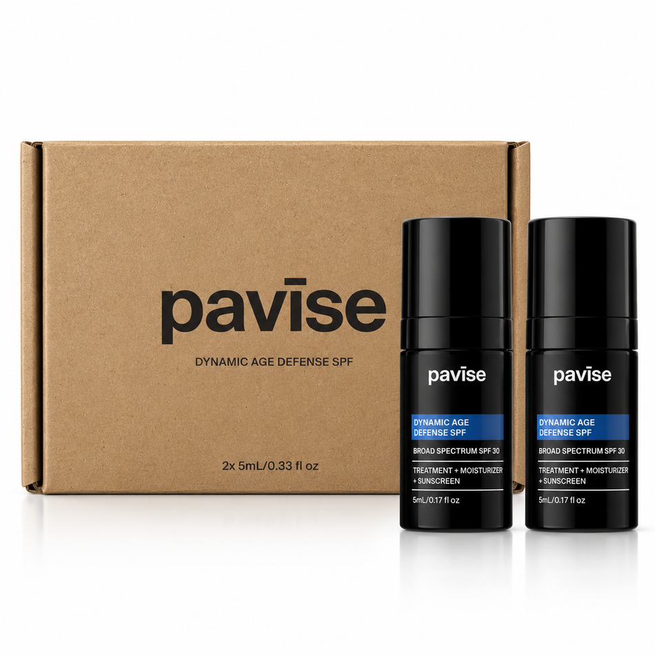 Pavise Dynamic Age Defense Mini 2 x 5ml SPF 30 mineral sunscreen and moisturizer set featuring two black travel-size bottles beside branded kraft packaging on a white background.