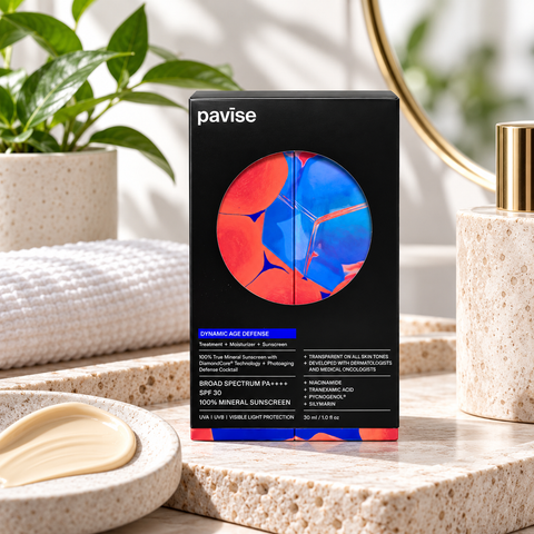 Pavise Dynamic Age Defense SPF 30 mineral sunscreen 30ml in black packaging displayed in a luxury skincare setting with a soft towel, natural greenery, and cream texture.