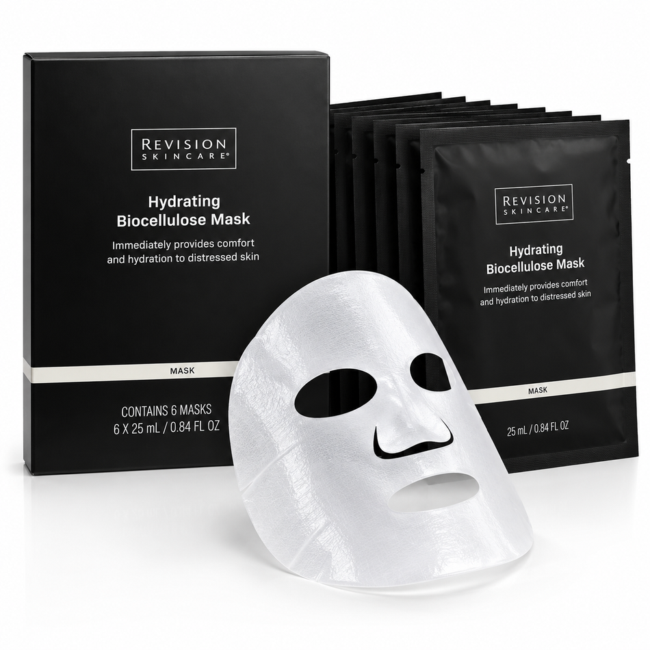 Woman wearing Revision Skincare Hydrating Biocellulose Facial Mask during a relaxing skincare routine, with the black 6-pack product box and individual mask sachet displayed beside her.